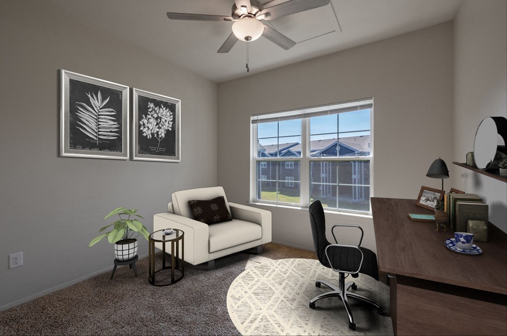 A room with a ceiling fan, a chair, a couch, a table, and a potted plant.