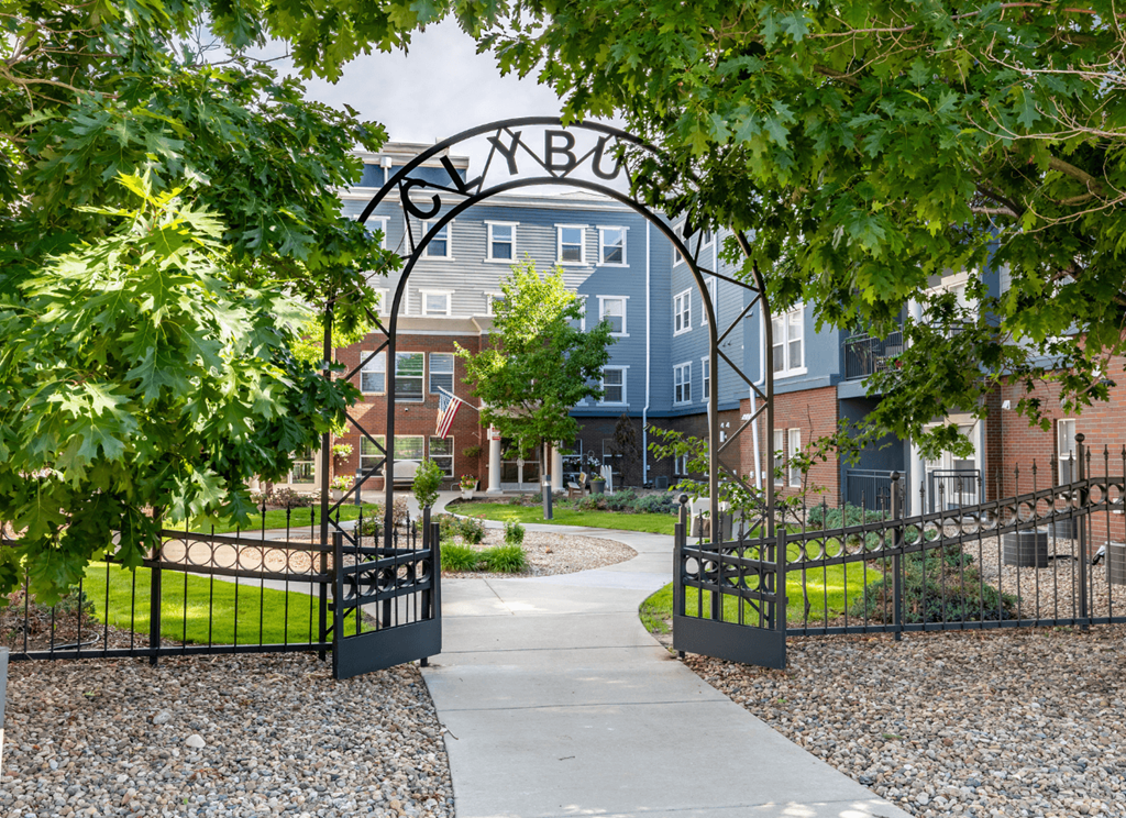 A black gate with the word "CYBEX" written on it.