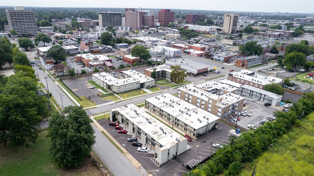 an aerial view of a city with buildings and cars at The Courts Midtown, Memphis, 38104