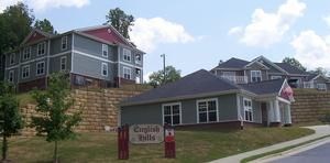 A house with a sign that says "Crawford Hills".
