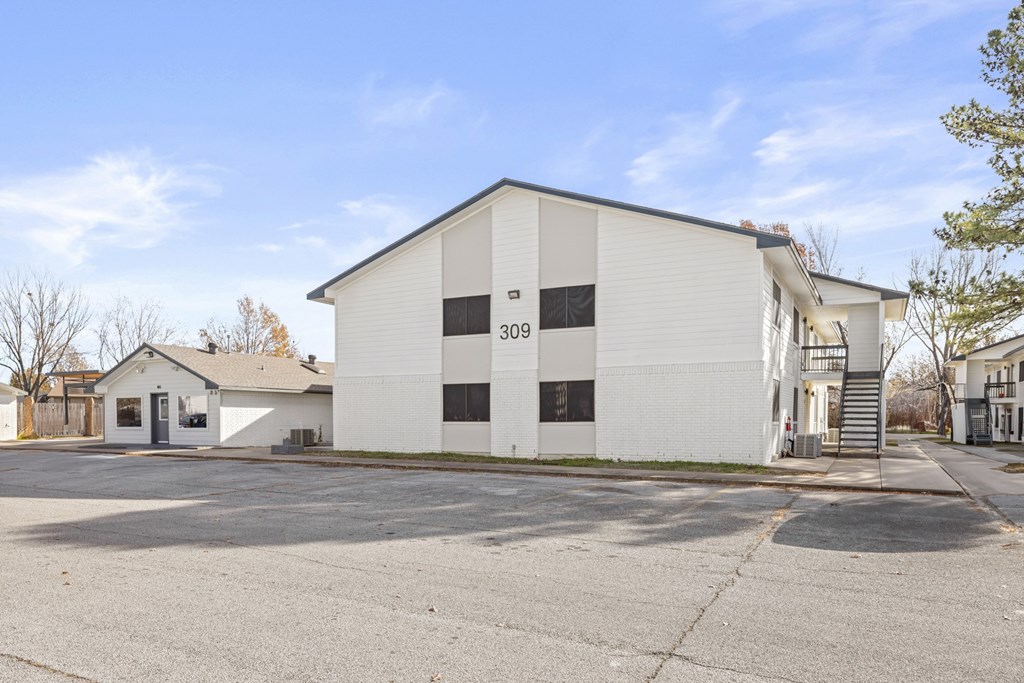 A white building with the number 309 on it.