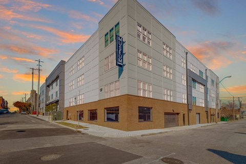 A modern building with a sign that says Museum.