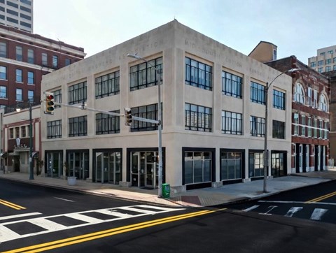 A large building with the words "Mid-South Cotton Exchange" on the side.