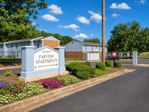 The entrance to Farview Apartments is marked by a large sign.