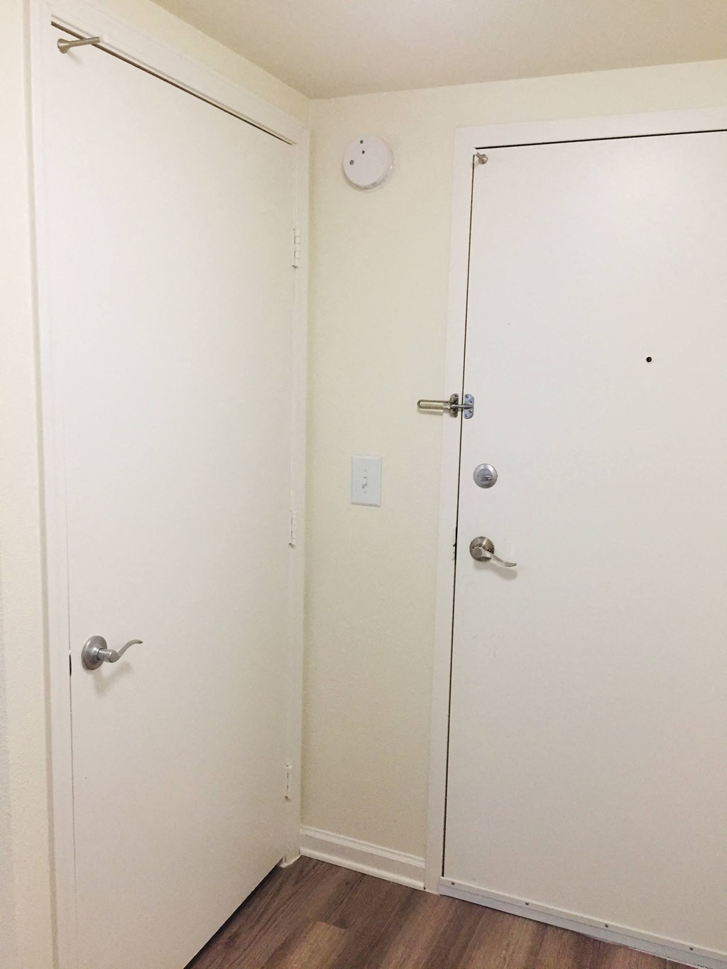 the door to the closet in the master bedroom is open