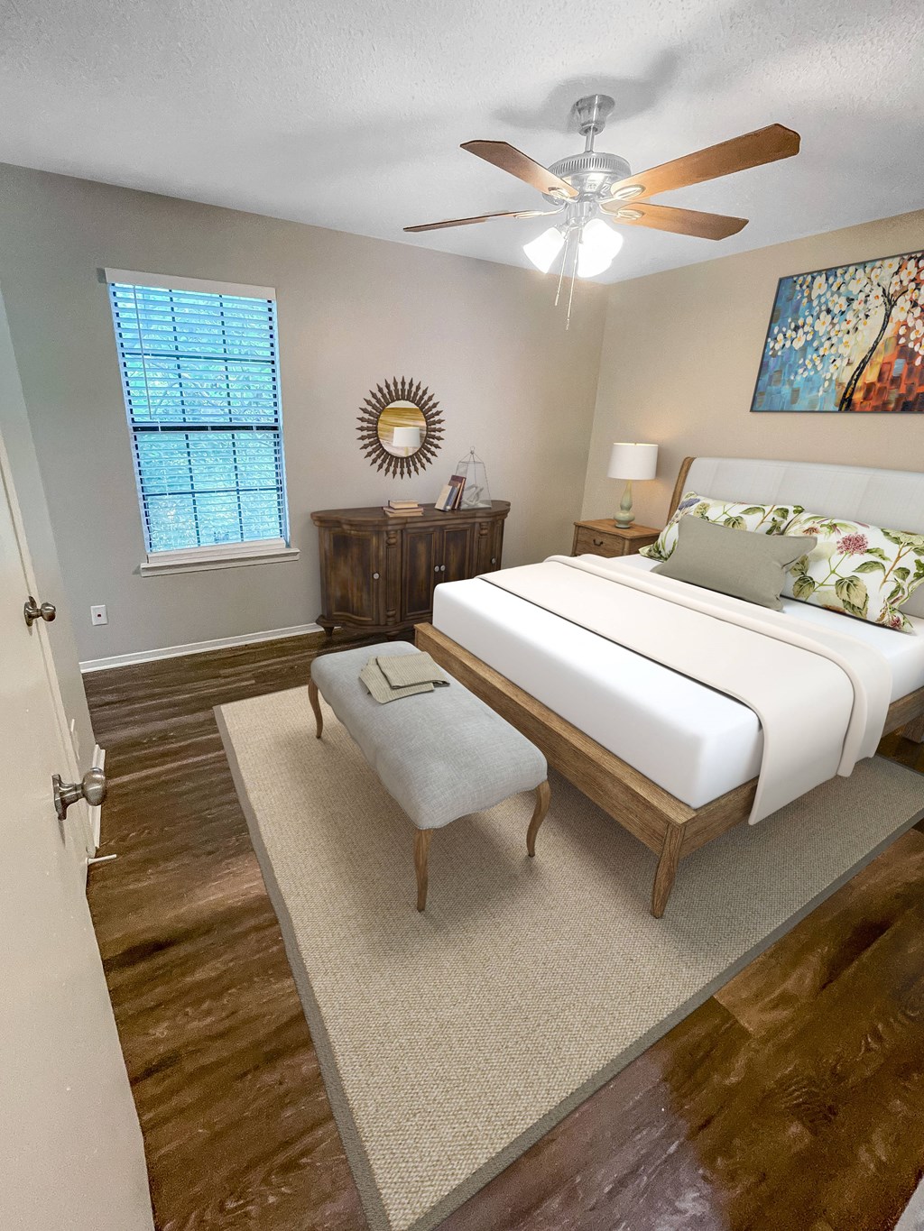 a bedroom with a large bed and a ceiling fan at The Junction, Memphis