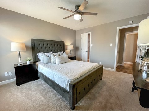 Bedroom With Ceiling Fan at Vanderbilt Apartments, St Peters, MO