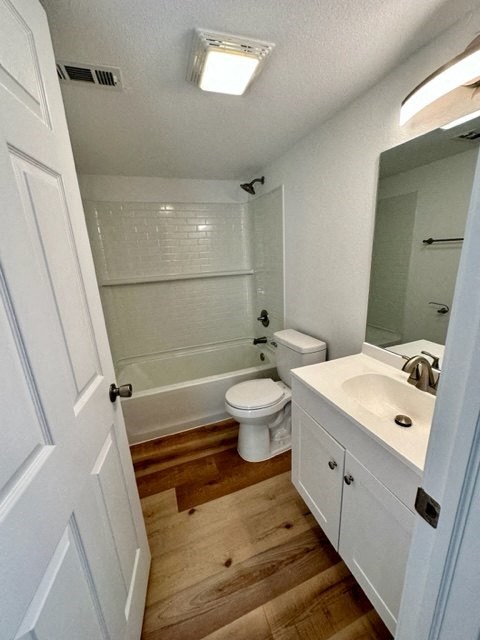 a bathroom with a toilet sink and bathtub