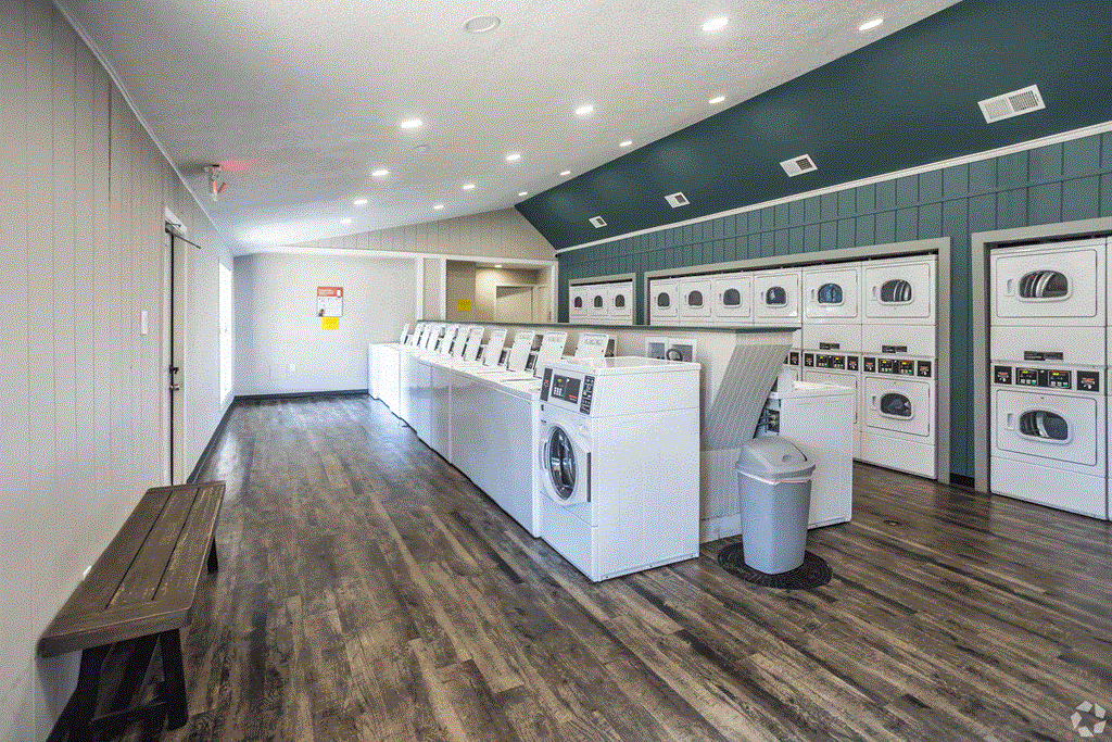 a spacious laundry room with washers and dryers at Azure Place Apartments, Memphis