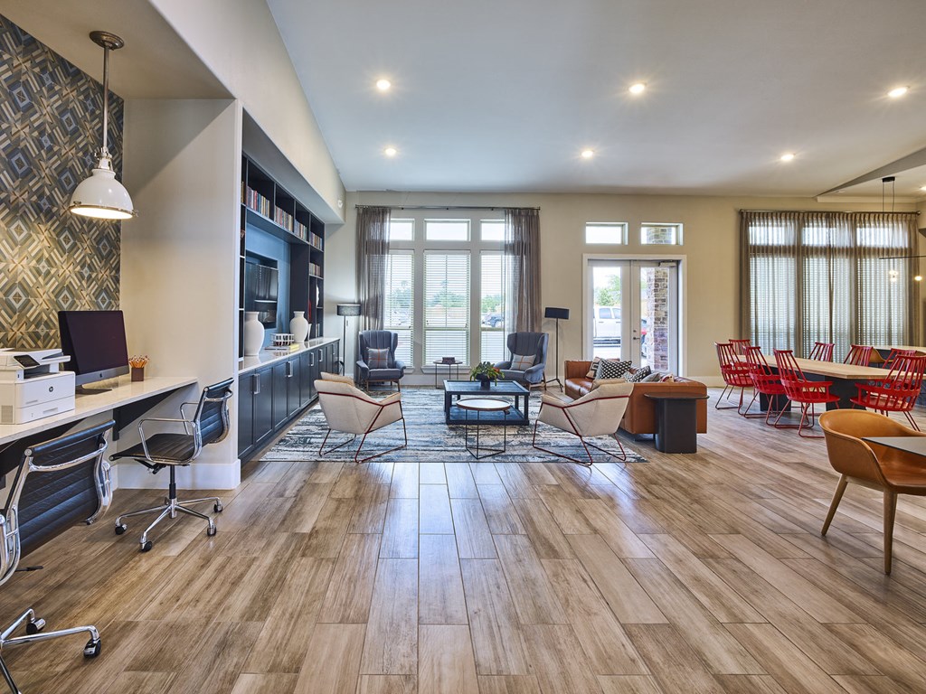 A modern living room with a wooden floor and furniture.