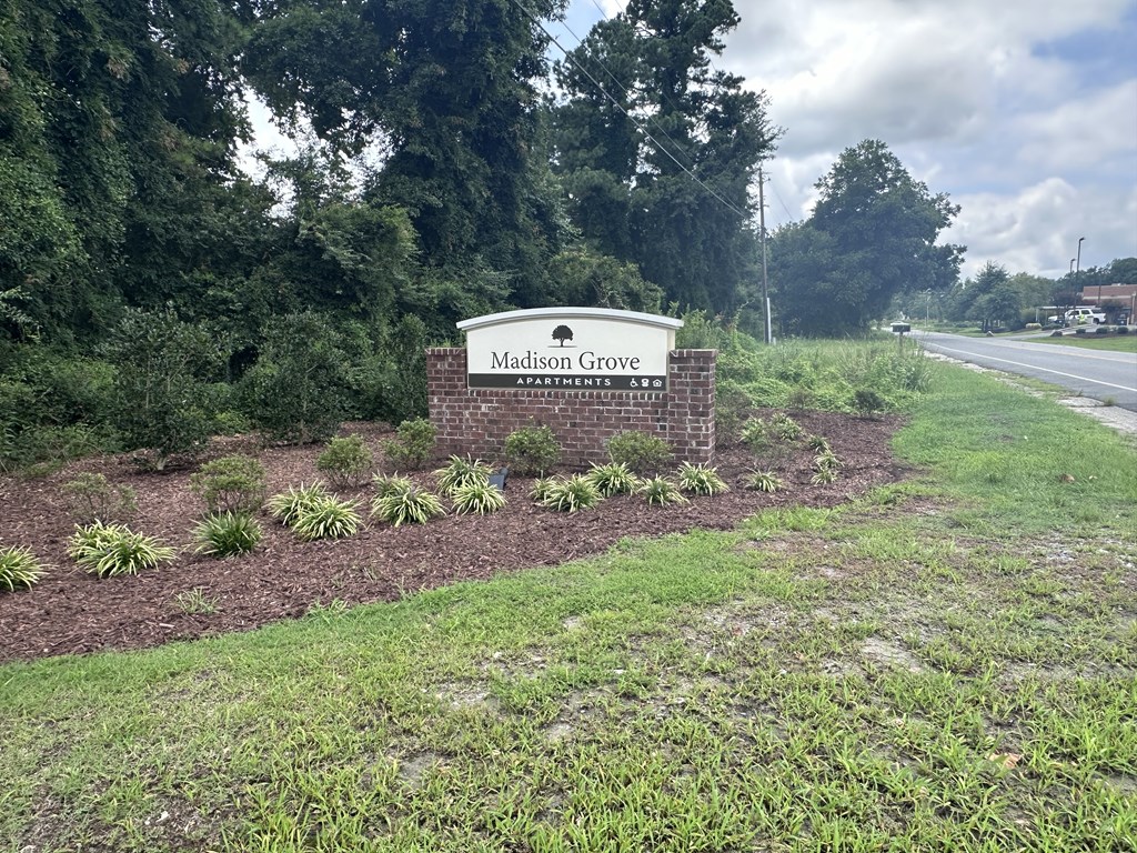a sign on the side of a road