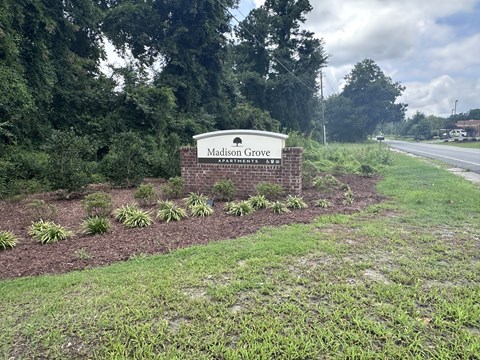a sign on the side of a road