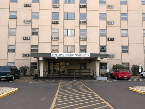 the front of the marriott hills apartments building