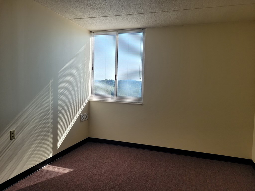 an empty room with a window