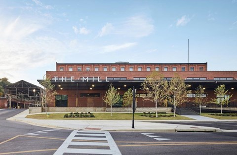 A building with the name "The Mill" on it.