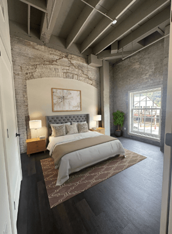 a bedroom with a bed and a window at The Mill at Prattville, Alabama, 36067