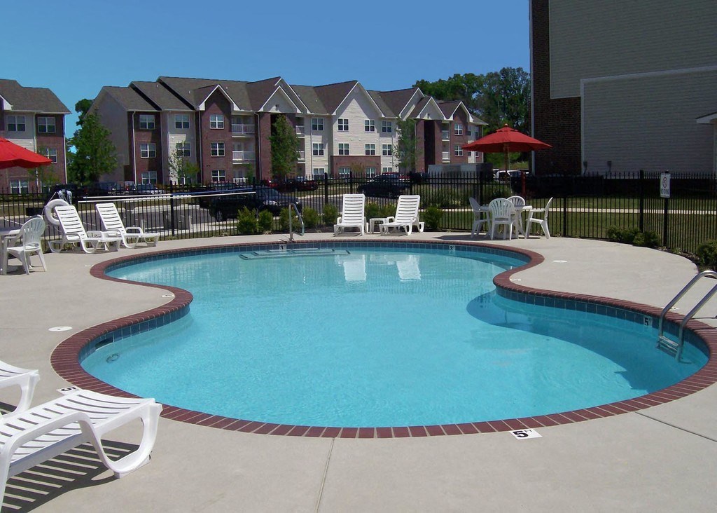the swimming pool at the apartments for rent