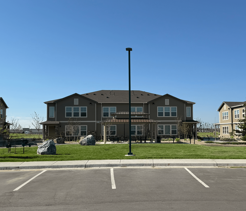 a large house with a street light in front of it