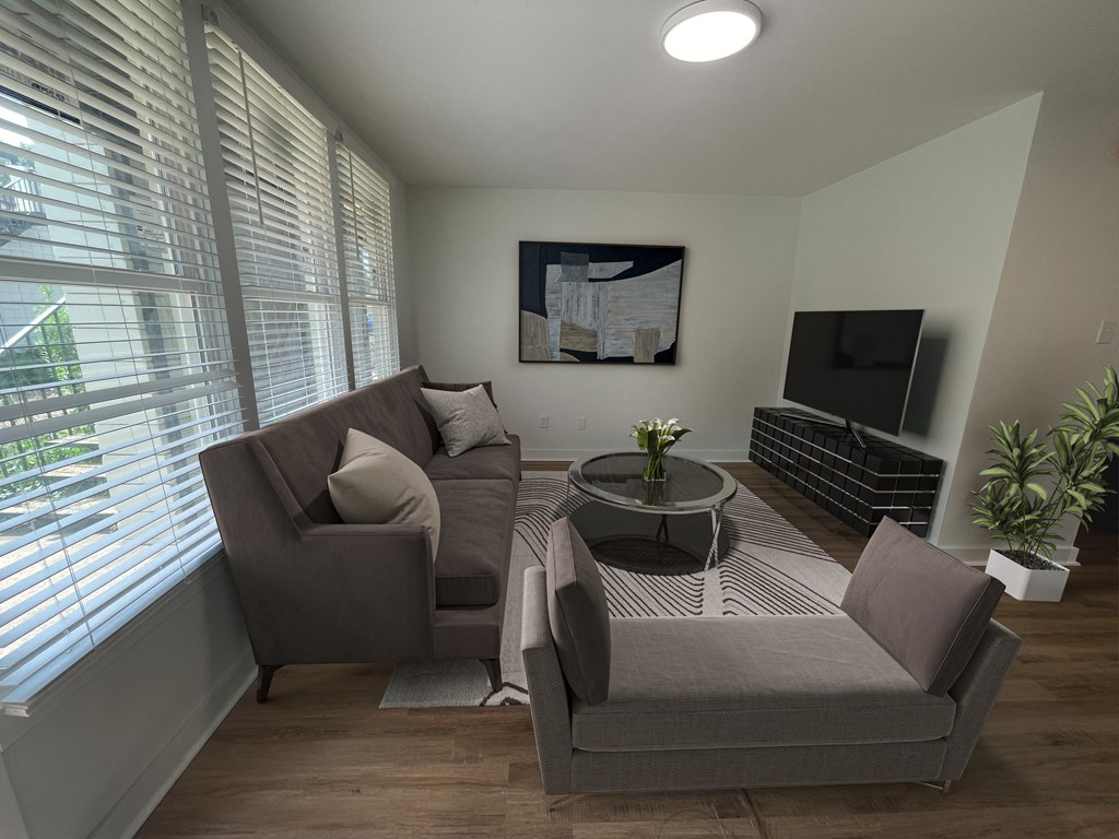 a small living room with a couch and two chairs at The Courts Midtown, Memphis, TN, 38104