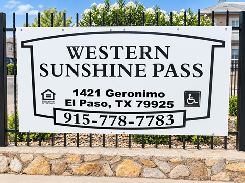 A sign for Western Sunshine Pass in El Paso, TX.