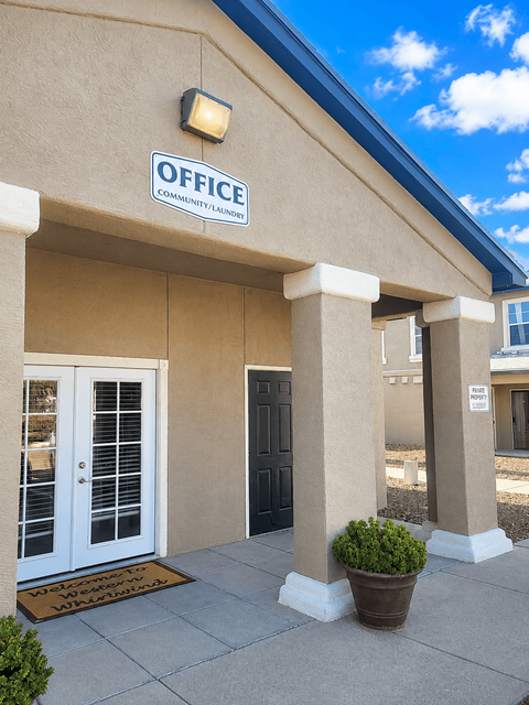 A building with a sign that says Office.