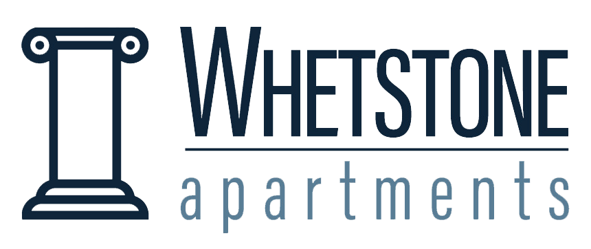 A logo for Whetstone Apartments featuring a column.
