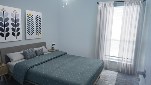 A bedroom with a large bed and two wall art pieces.