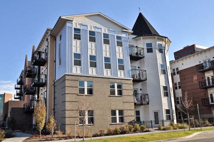 a building with a turret on the side of a street