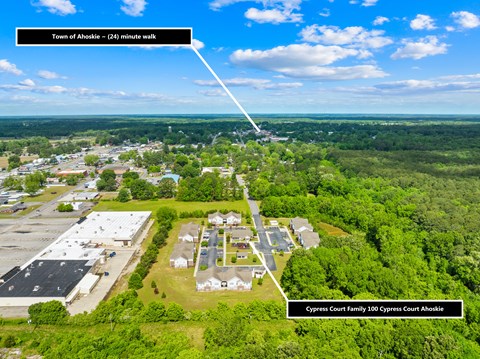 An aerial view of a town with a highlighted area indicating the location of the Cypress Court Family 100.