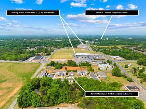 An aerial view of a residential area with a label pointing to Fernhill Family 136 Fiddlestead Lane SE Conover.