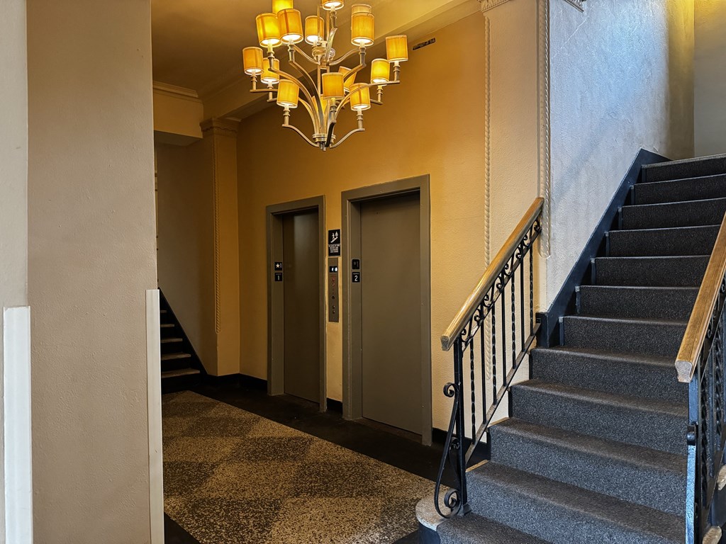 lobby stairs and elevator at Convent Gardens Apartments, St. Louis
