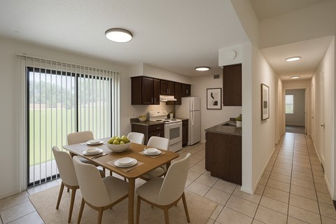 A modern kitchen with a dining table set for four.