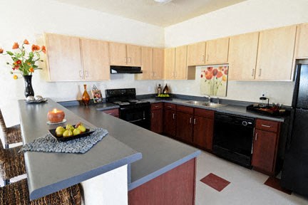 a large kitchen with a large counter top