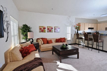 a living room with a couch and a table