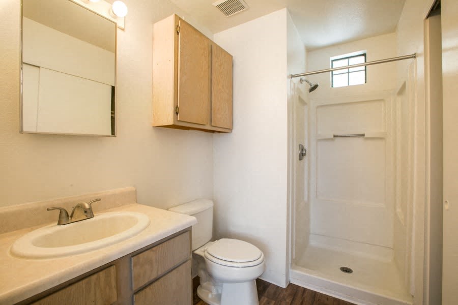 Bathroom with extra storage and a walk in shower