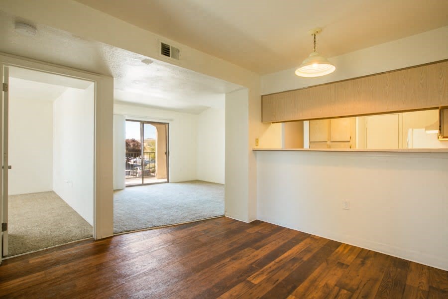 Open living area with rich wood vinyl plank flooring Open living area with rich wood vinyl plank flooring