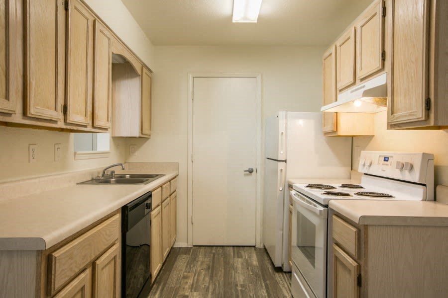 Kitchen with rich light wood cabinetry