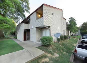 A modern house with a garage and a driveway.
