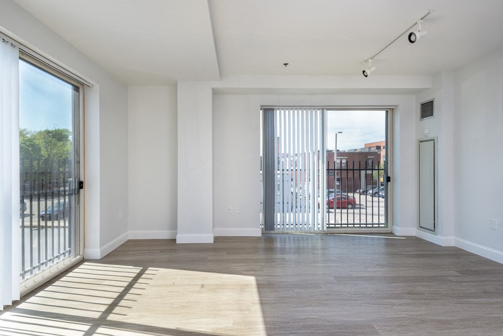 Living room area in the corner apartments at Munroe Place in Quincy, MA