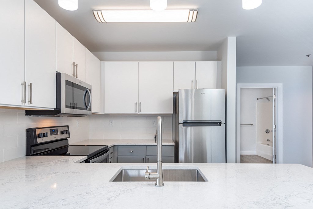 Munroe place apartment with high quality finishes in the kitchen and stainless steel appliances