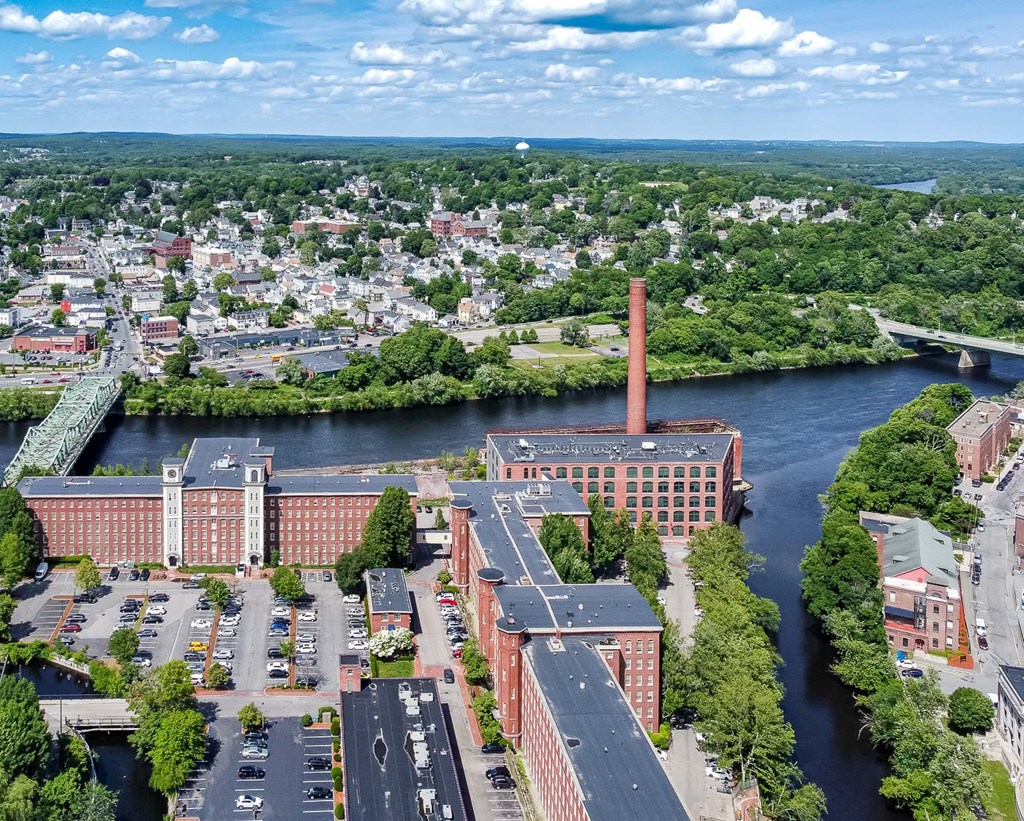 Mass Mills apartments in lowell aerial view of merrimack river