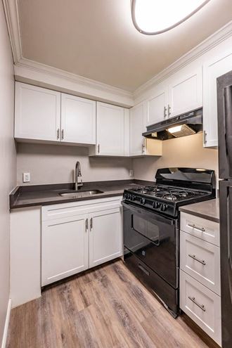 Renovated kitchen with gas stove