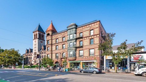 Historic architecture along Massachusetts Avenue including Cambridge City Hall near 929 Mass Apartments in Cambridge MA
