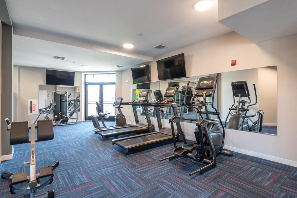 View of the cardio equipment in the fitness room at Millside
