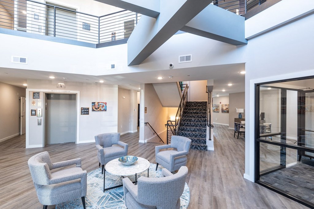 View of the main lobby and stairs at Millside Apartments in Canton
