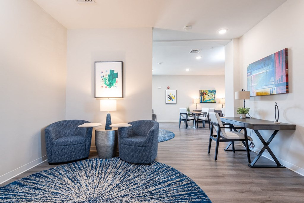 Resident lounge with tablet chairs at Millside in Canton