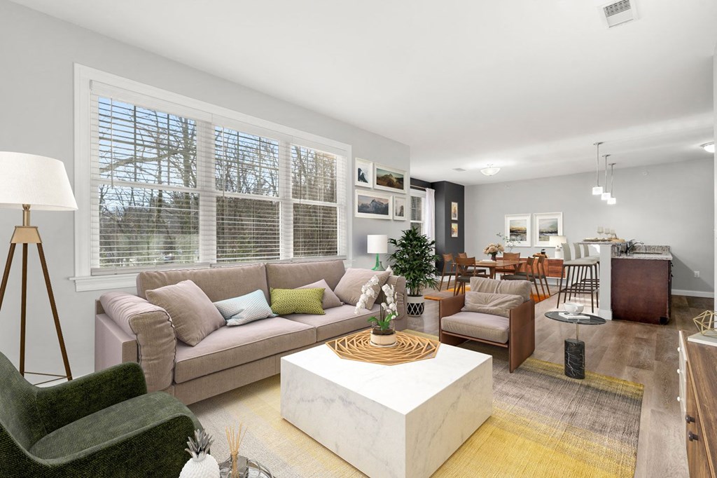 Virtually staged Ashland woods apartments living room, extra large floor plans and woods outside your window