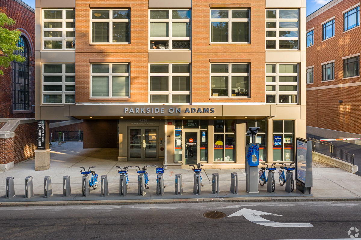 Bluebikes available outside the Front Door of Parkside on Adams