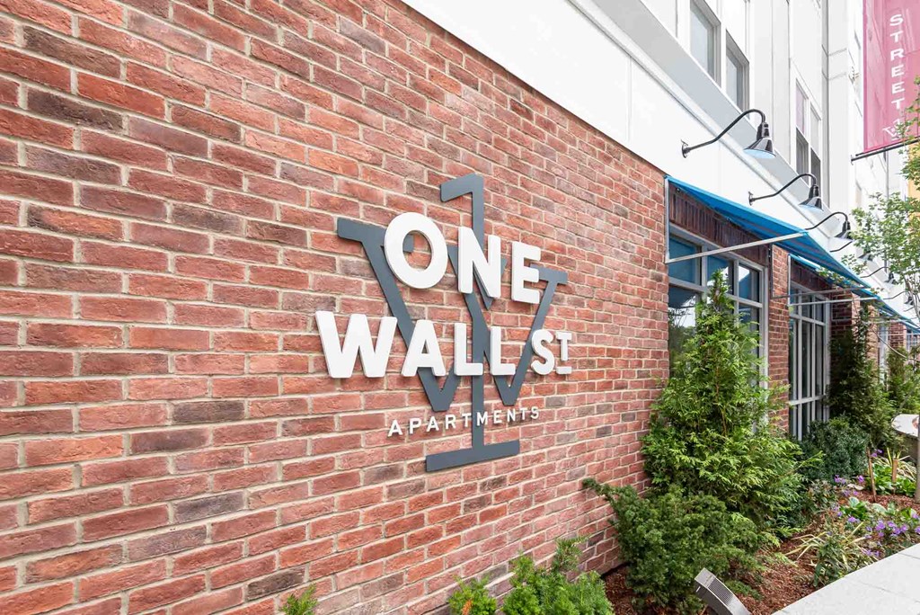 View of the One Wall St logo around the main entrance