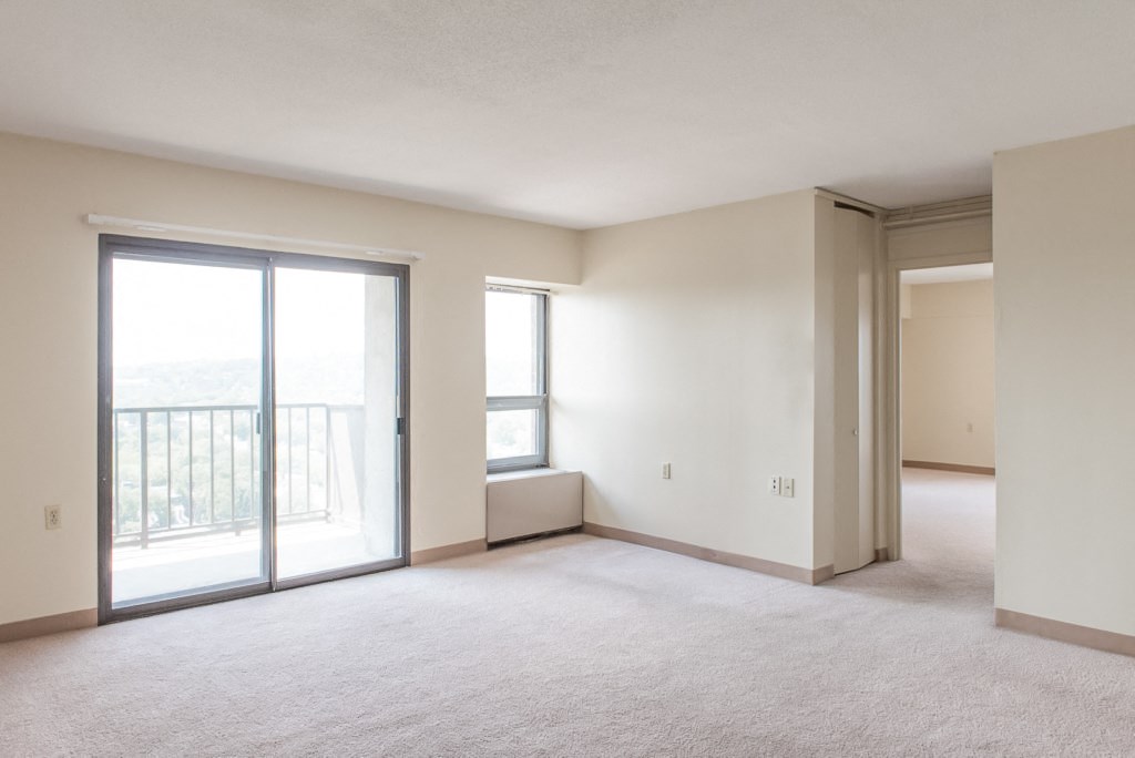 Babcock tower apartment with carpeting white finishes and balcony